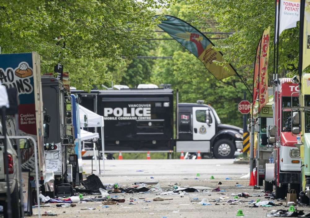 Debris is seen on East 43rd Avenue in Vancouver, where a vehicle drove into crowd at a Lapu Lapu Day festival the night before, on Sunday April 27, 2025. THE CANADIAN PRESS/Rich Lam