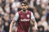 FILE - West Ham's Lucas Paqueta runs into position during the English Premier League soccer match between Tottenham Hotspur and West Ham United at the Tottenham Hotspur Stadium in London, Oct. 19, 2024. (AP Photo/Dave Shopland, File)