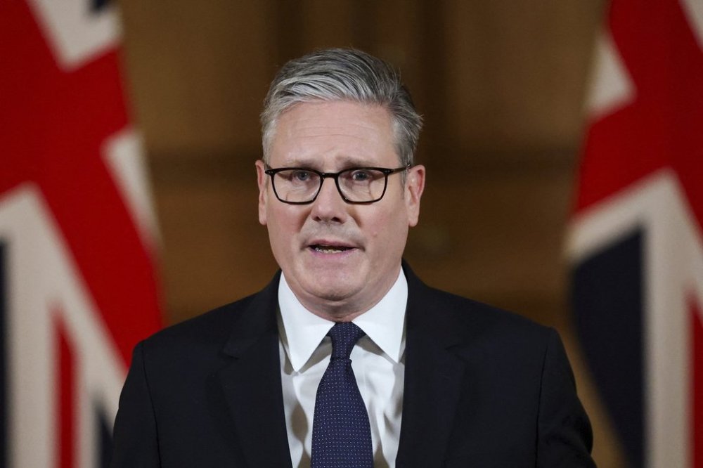Britain's Prime Minister Keir Starmer delivers a statement inside No. 10 Downing Street on the day the cabinet was recalled to discuss the situation in Gaza, in London, Tuesday, July 29, 2025. (Toby Melville, Pool Photo via AP)
