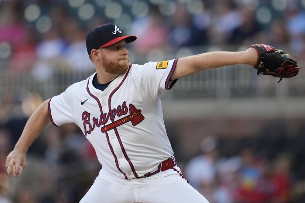 Atlanta Braves pitcher Davis Daniel (58) delivers in the first inning of a baseball game against the San Francisco Giants, Tuesday, July 22, 2025, in Atlanta. (AP Photo/Mike Stewart)