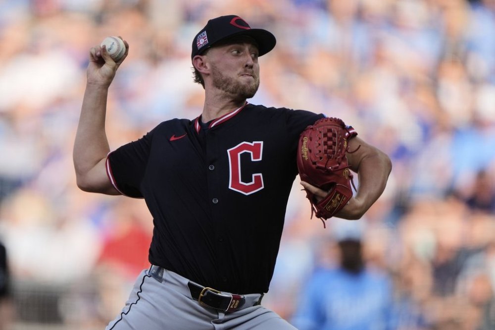 Cleveland Guardians starting pitcher Tanner Bibee throws during the first inning in the second baseball game of a doubleheader against the Kansas City Royals, Saturday, July 26, 2025, in Kansas City, Mo. (AP Photo/Charlie Riedel)