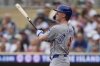Chicago Cubs' Pete Crow-Armstrong watches his two-run home run during the third inning of a baseball game against the Minnesota Twin,s Thursday, July 10, 2025, in Minneapolis. (AP Photo/Abbie Parr)