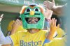 Boston Red Sox's Trevor Story wears a Wally the Green Monster mask after hitting a two-run home run in the third inning of a baseball game against the Houston Astros, Saturday, Aug. 2, 2025, in Boston. (AP Photo/Greg M. Cooper)