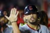 Cleveland Guardians' Gabriel Arias is congratulated in the dugout after hitting a home run during the sixth inning of a baseball game against the New York Mets at Citi Field in New York, Monday, Aug. 4, 2025. (Gordon Donovan via AP)