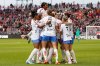 Montreal Roses FC forward Tanya Boychuk (12) is surrounded by her teammates as they celebrate her scoring a goal against AFC Toronto during first half Northern Super League soccer action in Toronto on Saturday, April 19, 2025. THE CANADIAN PRESS/Arlyn McAdorey