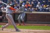 San Francisco Giants' Rafael Devers hits a three-run homer during the third inning of a baseball game against the New York Mets, Sunday, Aug. 3, 2025, in New York. (AP Photo/Seth Wenig)