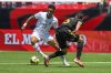 FILE - Switzerland's Dan Ndoye (11) dribbles the ball around the defense of Mexico's Emilio Lara (15) during an international friendly soccer match, Saturday, June 7, 2025, in Salt Lake City, Utah. (AP Photo/Tyler Tate, File)