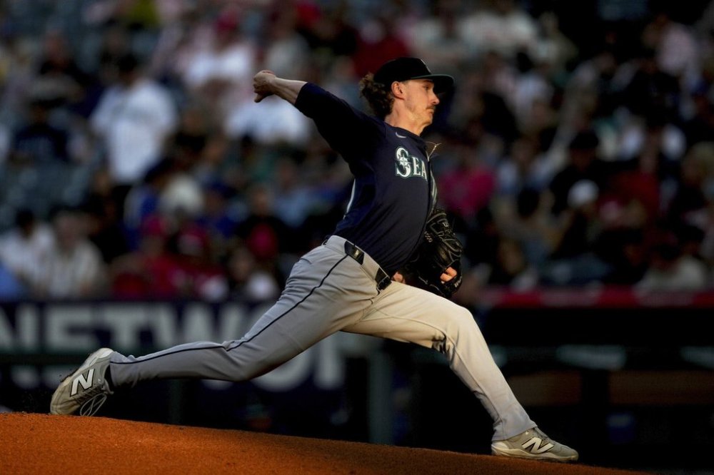 FILE - Seattle Mariners starting pitcher Bryce Miller delivers during the first inning of a baseball game against the Los Angeles Angels, June 6, 2025, in Anaheim, Calif. (AP Photo/Eric Thayer, File)