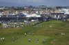 Antoine Rozner of France, bottom right, plays his second shot to the 1st green during a practice round for the British Open golf championship at the Royal Portrush Golf Club, Northern Ireland, Wednesday, July 16, 2025. (AP Photo/Jon Super)