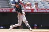 Arizona Diamondbacks' Blaze Alexander hits an RBI double during the fourth inning of a baseball game against the Los Angeles Angels in Anaheim, Calif., Sunday, July 13, 2025. (AP Photo/Jessie Alcheh)
