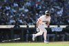 Seattle Mariners' Dominic Canzone heads to first after hitting an RBI single to score Eugenio Suárez for a walkoff win during the 11th inning of a baseball game against the Chicago White Sox, Thursday, Aug. 7, 2025, in Seattle. (AP Photo/Jason Redmond)