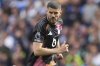 FILE - Leicester's Conor Coady runs into position during the English Premier League soccer match between Brighton and Hove Albion and Leicester City, at the American Express Stadium in Brighton, England, Saturday, April 12, 2025. (AP Photo/Dave Shopland, File)