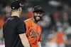 Baltimore Orioles' Cedric Mullins, right, celebrates after his team's victory over the Colorado Rockies in a baseball game, Saturday, July 26, 2025, in Baltimore. (AP Photo/Stephanie Scarbrough)