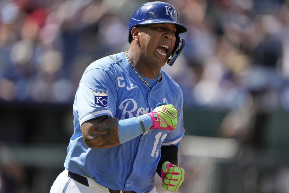 Kansas City Royals' Salvador Perez celebrates as he runs to first after hitting an RBI single to win the baseball game during the 10th inning against the Atlanta Braves, Wednesday, July 30, 2025, in Kansas City, Mo. (AP Photo/Charlie Riedel)