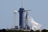 FILE - A SpaceX Falcon 9 rocket, with the crew Dragon capsule attached, vents fuel while sitting on Kennedy Space Center's Launch Pad 39-A, July 31, 2025, in Cape Canaveral, Fla. (AP Photo/Chris O'Meara, File)