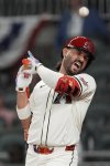 Arizona Diamondbacks' Eugenio Suárez gets hit by a pitch during eighth inning at the MLB baseball All-Star game between the American League and National League, Tuesday, July 15, 2025, in Atlanta. (AP Photo/Mike Stewart)