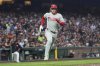 Philadelphia Phillies' Alec Bohm runs home to score against the San Francisco Giants during the sixth inning of a baseball game in San Francisco, Tuesday, July 8, 2025. (AP Photo/Jeff Chiu)