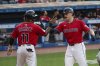 Cleveland Guardians' Jose Ramirez (11) congratulates Kyle Manzardo after his two-run home run off Colorado Rockies starting pitcher Tanner Gordon during the third inning of a baseball game, Tuesday, July 29, 2025, in Cleveland. (AP Photo/Phil Long)