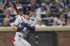 Cleveland Guardians' Steven Kwan follows through on an RBI single during the seventh inning of a baseball game against the New York Mets Tuesday, Aug. 5, 2025, in New York. (AP Photo/Frank Franklin II)