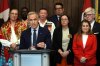 Prime Minister Mark Carney is joined by members of his cabinet and caucus as he speaks at a news conference in the Foyer of the House of Commons in Ottawa, after Bill C-5 passed in the House, on Friday, June 20, 2025. THE CANADIAN PRESS/Justin Tang