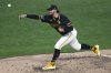 Pittsburgh Pirates pitcher Paul Skenes delivers during the sixth inning of a baseball game against the Cincinnati Reds in Pittsburgh, Thursday, Aug. 7, 2025. (AP Photo/Gene J. Puskar)