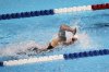 FILE - Megan Romano swims in the women's 100-meter freestyle preliminaries at the U.S. Olympic swimming trials, Friday, June 29, 2012, in Omaha, Neb. (AP Photo/Nati Harnik, File)