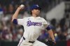 Texas Rangers starting pitcher Jacob deGrom throws during the first inning of a baseball game against the Athletics, Tuesday, July 22, 2025, in Arlington, Texas. (AP Photo/LM Otero)