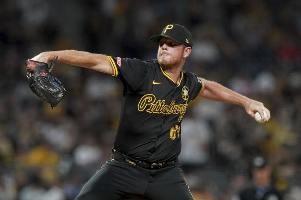 Pittsburgh Pirates relief pitcher Caleb Ferguson delivers during the seventh inning of a baseball game against the Arizona Diamondbacks, Saturday, July 26, 2025, in Pittsburgh. (AP Photo/Matt Freed)