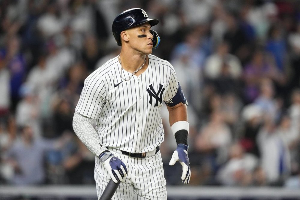 New York Yankees designated hitter Aaron Judge runs after hitting a sacrifice fly during the 10th inning of a baseball game against the Seattle Mariners, Thursday, July 10, 2025, in New York. (AP Photo/Yuki Iwamura)