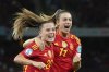 Spain's Claudia Pina celebrates with Alexia Putellas, right, after scoring her side's second goal during the Women's Euro 2025 quarterfinals soccer match between Spain and Switzerland at Stadion Wankdorf in Bern, Switzerland, Friday, July 18, 2025. (AP Photo/Alessandra Tarantino)