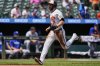 Baltimore Orioles' Jordan Westburg (11) advances toward home plate to score on a sacrifice fly hit by Tyler O'Neill during the first inning in the first baseball game of a doubleheader against the Toronto Blue Jays, Tuesday, July 29, 2025, in Baltimore. (AP Photo/Stephanie Scarbrough)