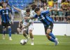 CF Montreal's Fernando Alvarez, right, battles with Club Leon's Adonis Frias during first half Leagues Cup action In Montreal on Tuesday, July 29, 2025. THE CANADIAN PRESS/Peter McCabe