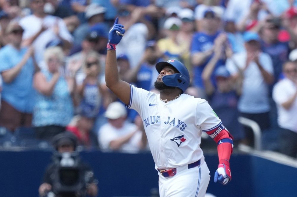 Toronto Blue Jays first base Vladimir Guerrero Jr. (27) celebrates his solo home run during first inning MLB action against the San Francisco Giants in Toronto on Sunday, July 20, 2025.  THE CANADIAN PRESS/Nathan Denette