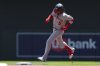 Washington Nationals' CJ Abrams runs through second base after hitting a home run during the first inning of a baseball game against the Minnesota Twins, Sunday, July 27, 2025, in Minneapolis. (AP Photo/Stacy Bengs)