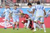 Toronto FC's Ola Brynhildsen (centre) goes down under Atlanta United's Efrain Morales' (second right) challenge during first half MLS action in Toronto, on Saturday, July 12, 2025. THE CANADIAN PRESS/Chris Young