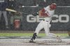 Cincinnati Reds TJ Friedl lets go of the bat in the rain during the first inning of the MLB Speedway Classic baseball game between the Atlanta Braves and the Cincinnati Reds at Bristol Motor Speedway in Bristol, Tenn., Saturday, Aug. 2, 2025. (AP Photo/George Walker IV)