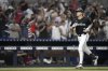 Miami Marlins' Kyle Stowers runs the bases after hitting a grand slam in the seventh inning of a baseball game against the New York Yankees, Friday, Aug. 1, 2025, in Miami. (AP Photo/Rebecca Blackwell)