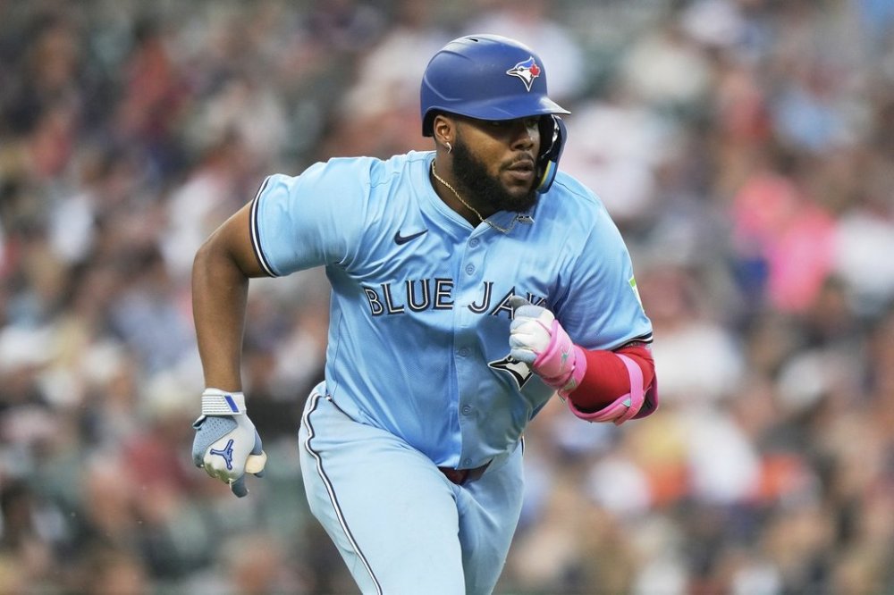 Toronto Blue Jays' Vladimir Guerrero Jr. runs after hitting a double to score Nathan Lukes during the fifth inning of a baseball game against the Detroit Tigers Friday, July 25, 2025, in Detroit. (AP Photo/Ryan Sun)