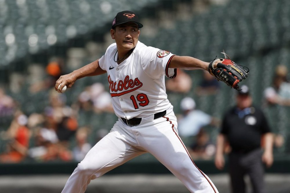 Baltimore Orioles pitcher Tomoyuki Sugano throws during the sixth inning of a baseball game against the Colorado Rockies in Baltimore, Sunday, July 27, 2025. (AP Photo/Terrance Williams)