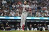 Arizona Diamondbacks' Eugenio Suarez reacts after being hit by a pitch during the ninth inning of a baseball game against the Detroit Tigers Monday, July 28, 2025, in Detroit. (AP Photo/Ryan Sun)