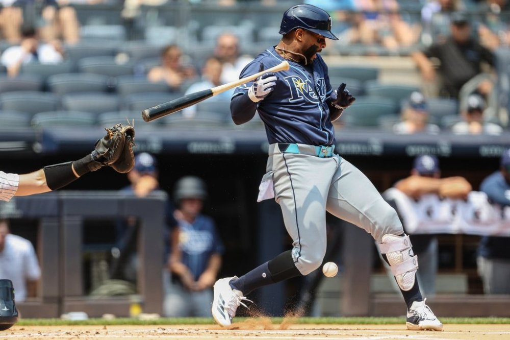 Tampa Bay Rays' Yandy Díaz is hit by a pitch in the first inning of a baseball game against the New York Yankees, Thursday, July 31, 2025, in New York. (AP Photo/Heather Khalifa)