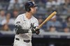 New York Yankees' Cody Bellinger follows through on a three-run home run during the third inning of a baseball game against the Tampa Bay Rays Tuesday, July 29, 2025, in New York. (AP Photo/Frank Franklin II)