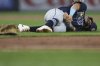 Tampa Bay Rays' Jonathan Aranda reacts after he was injured in the fifth inning of a baseball game against the New York Yankees, Thursday, July 31, 2025, in New York. (AP Photo/Heather Khalifa)