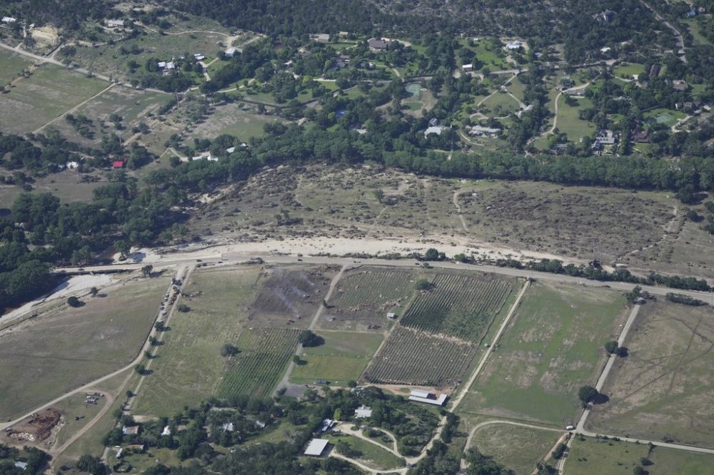 Damage is seen on Tuesday, July 8, 2025, near Hunt, Texas, after a flash flood swept through the area. (AP Photo/Ashley Landis)