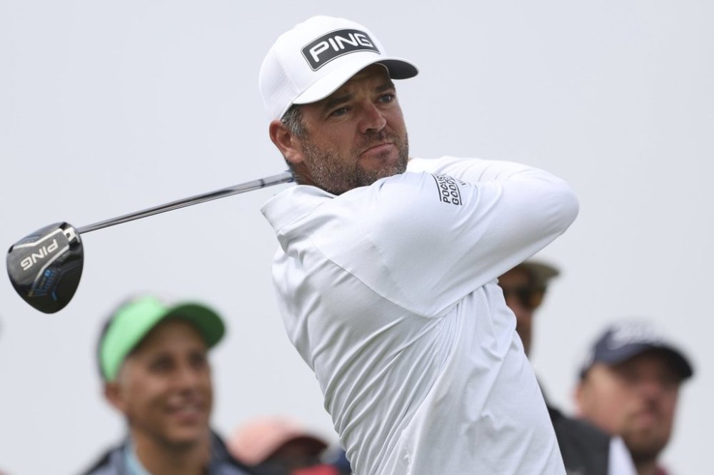 Corey Conners of Canada plays off the 14th tee during a practice round for the British Open golf championship at the Royal Portrush Golf Club, Northern Ireland, Tuesday, July 15, 2025. (AP Photo/Peter Morrison)