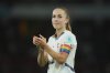 Switzerland's Lia Waelti, wearing a team captain rainbow armband, applauds the fans at the end of the Women's Euro 2025 quarterfinals soccer match between Spain and Switzerland at Stadion Wankdorf in Bern, Switzerland, Friday, July 18, 2025. (AP Photo/Alessandra Tarantino)