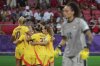 Belgium's Tessa Wullaert celebrates with teammates after scoring her sides first goal during the Women¥s Euro 2025, group B, soccer match between Portugal and Belgium at Stade de Tourbillon in Sion, Switzerland, Friday, July 11, 2025. (AP Photo/Alessandra Tarantino)