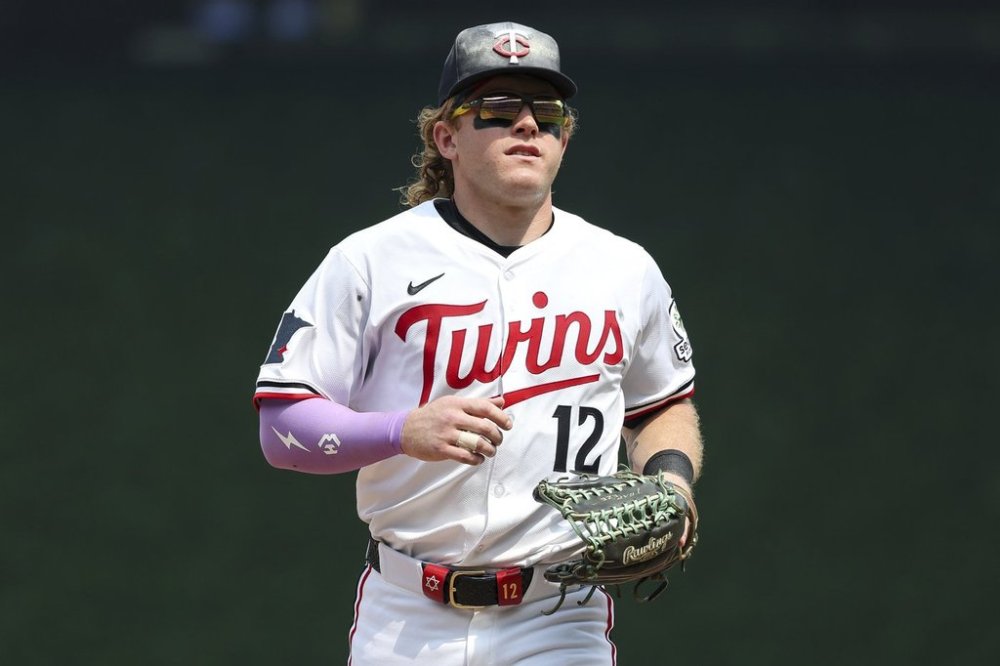 Minnesota Twins center fielder Harrison Bader runs into the dugout during the ninth inning of baseball game against the Boston Red Sox, Wednesday, July 30, 2025, in Minneapolis. (AP Photo/Matt Krohn)