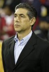 Iran's team coach Afshin Ghotbi attends his team's AFC Asian Cup quarterfinal soccer match against South Korea in Doha, Qatar, Saturday, Jan. 22, 2011. (AP Photo/Hassan Ammar)