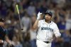 Seattle Mariners first baseman Josh Naylor hits a two RBI home run off Chicago White Sox pitcher Bryan Hudson during the seventh inning of a baseball game, Tuesday, Aug. 5, 2025, in Seattle. (AP Photo/John Froschauer)